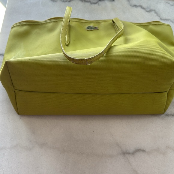 Lacoste bag with zipper and pick inside . Great condition and beautiful color . - Picture 3 of 3